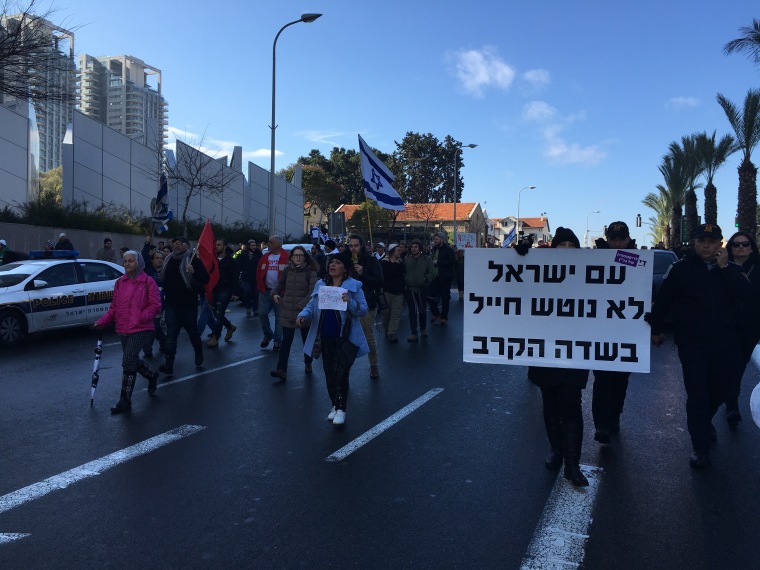 Image: Supporters of Elor Azaria marched outside the military court, shouting and cheering