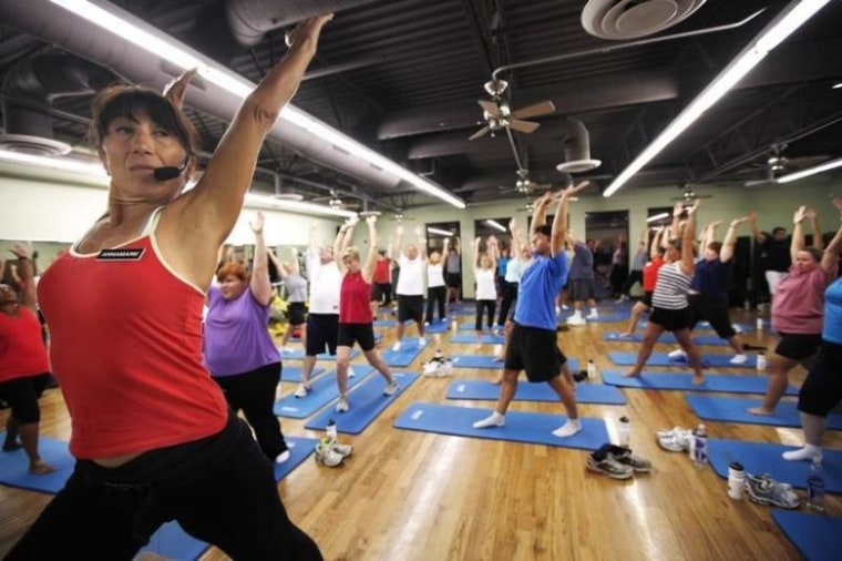 Trainer Anne Marie Smith leads guests in a Pilates workout before dawn at the Biggest Loser Resort in Ivins