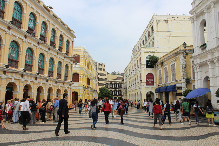 Senado Square in Macao, a UNESCO World Heritage site, with tiled walks, Portuguese-styled government buildings and designer shopping.