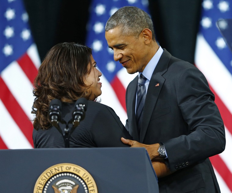 Undocumented DREAMer Silva hugs U.S. President Obama