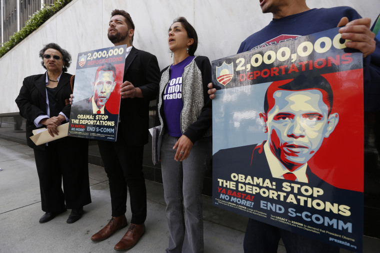 Members of a coalition of Latino groups rally outside the Federal Building in Los Angeles on March. 26, 2014. The rally was part of the "Obama Legacy Project," a campaign looking to hold President Obama accountable for record deportations.