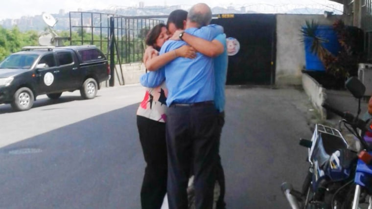 Venezuelan activist and lawyer Francisco Marquez hugs his parents for the first time after being released from the SEBIN prison on October 18, 2016 in Caracas, Venezuela. 
