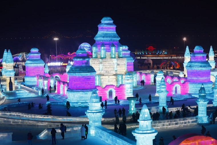 Stunning Ice Sculptures Glow in Neon at Chinese Festival