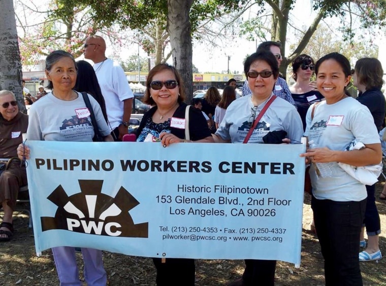 Emily Uy, third from left, at an event for the Pilipino Workers Center.