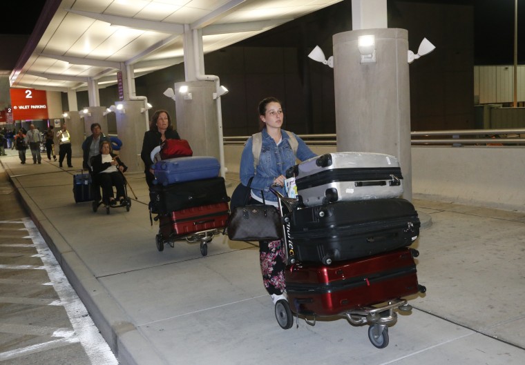 Image: Passengers are eventually allowed to leave Fort Lauderdale-Hollywood International Airport.