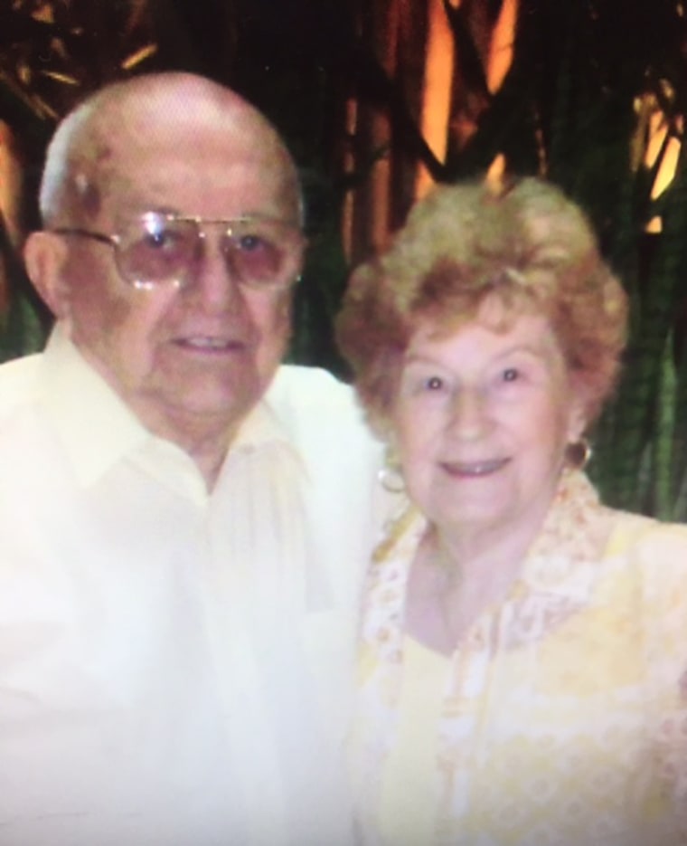 Image: Victim of the Jan. 6 shooting at the Ft. Lauderdale International Airport Olga Woltering poses for a photo with her husband in an undated family photo.