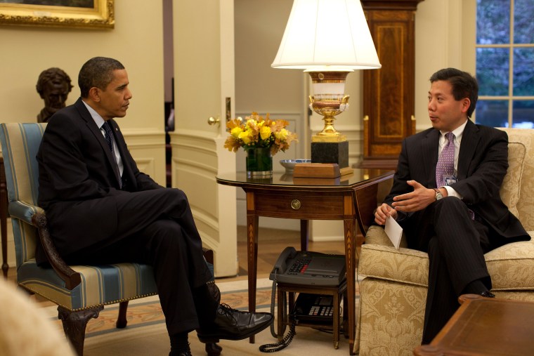 President Barack Obama  meets with Chris Lu, cabinet secretary, in the Oval Office prior to the Cabinet Meeting, Nov. 23, 2009.  (Official White House Photo by Pete Souza)