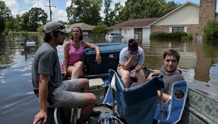 Image: As many as 30,000 people have been rescued following unprecedented floods in the southern US state of Louisiana