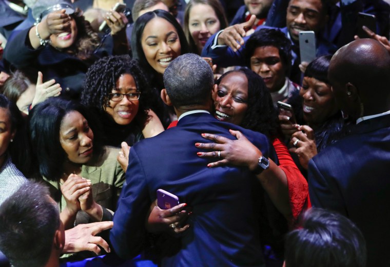 Image: President Obama is embraced by a woman in the crowd as he greets supporters after his farewell address at McCormick Place in Chicago on Jan. 10.