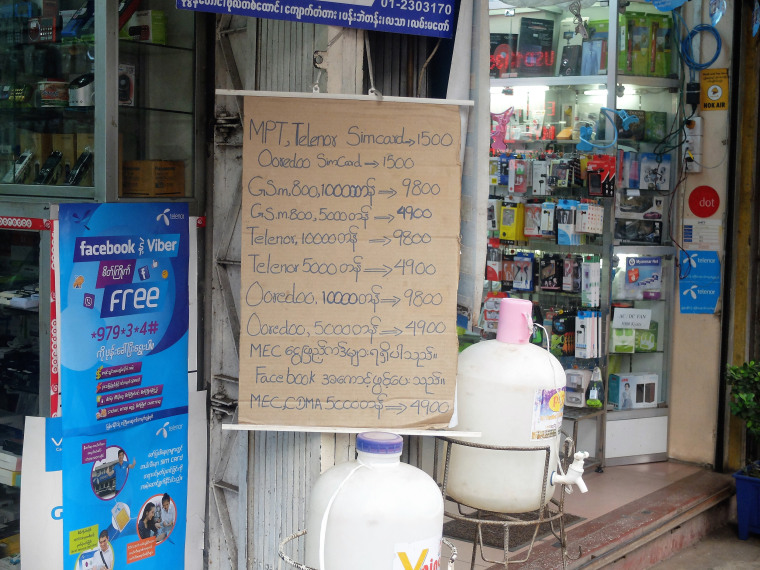 Image: A cardboard sign outside a shop in Yangon
