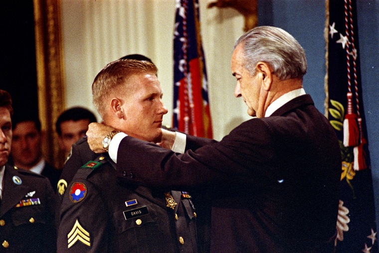 Sgt. Sammy Lee Davis receives the Medal of Honor from President Lyndon B. Johnson on Nov. 19, 1968.
