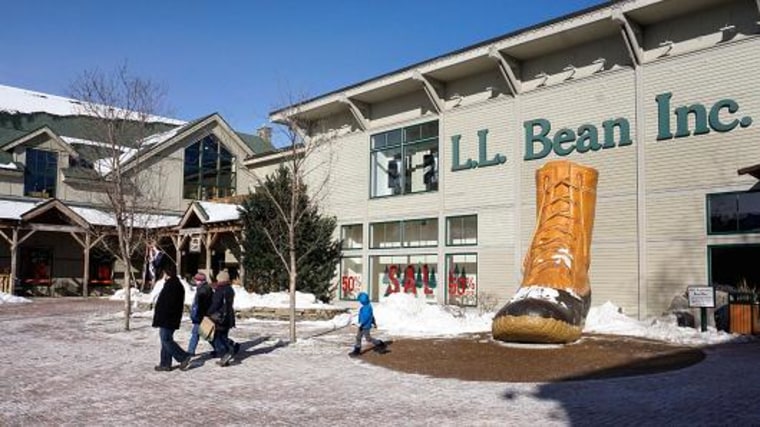 People walk through a plaza at an entrance to the L.L. Bean flagship store in Freeport, Maine. Gregory Rec | Portland Press Herald | Getty Images
