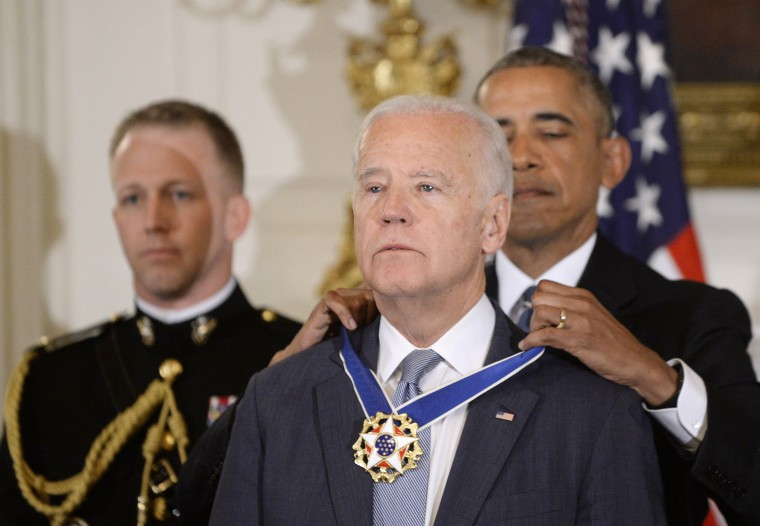 Image: President Barack Obama (R) presents the Medal of Freedom to Vice-President Joe Biden during an event  in the State Dinning room of the White House, on Jan. 12, 2017 in Washington, D.C.
