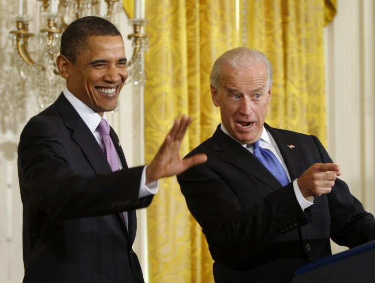 US Vice President Biden and President Obama wave to participants of the Mayors Conference at the White House in Washington