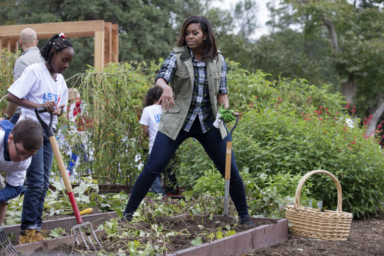Image: First Lady Michelle Obama and students harvest the White House Kitchen Garden for her final time as First Lady