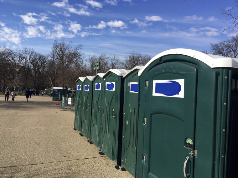 Portable restrooms, with the name "Don's Johns" covered up, are lined up on Capitol Hill in Washington on Jan. 13. Virginia-based Don's Johns calls itself the Washington area's top provider of portable toilet rentals, but the name apparently strikes too close to home for inaugural organizers.