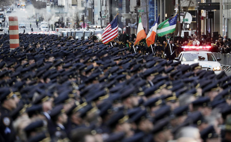 Image: Police officers fill New York's Fifth Avenue prior to the funeral for Detective Steven McDonald at St. Patrick's Cathedral in New York, New York on Jan. 13.