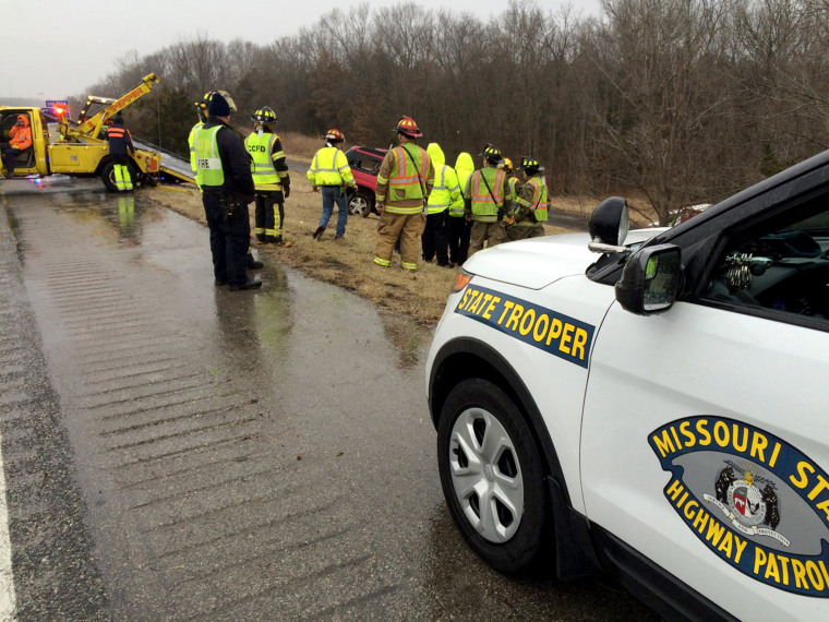 Image: Missouri State Highway Patrol assist a vehicle that has slid off the highway due to icy conditions, Jan. 14, 2017.