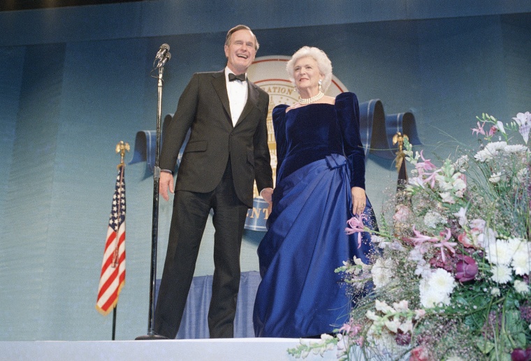 President George H.W. Bush and Barbara Bush attend the inaugural ball.