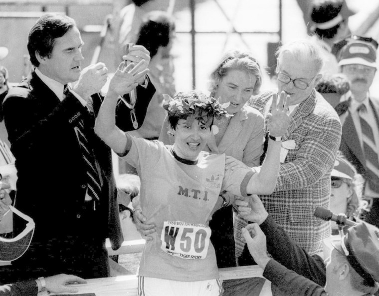 Image: Rosie Ruiz, of New York, waves to the crowd after she was announced the women's winner of the Boston Marathon in 1980