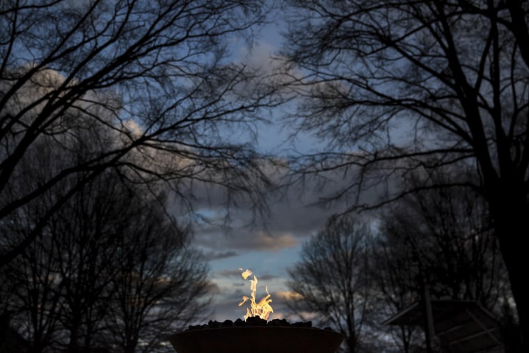 Image: An eternal flame burns at the grave site of Rev. Martin Luther King Jr. on Jan. 16 in Atlanta, Georgia.