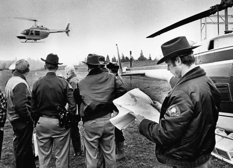 Image: In this undated file photo, a helicopter takes off from search headquarters to scour the area where hijacker Dan Cooper might have parachuted into in Woodland, Wash.