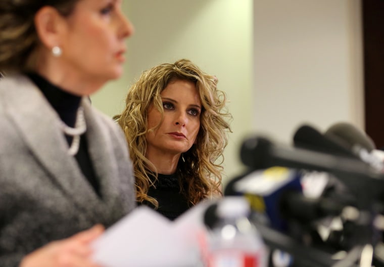 Image: Summer Zervos listens as her attorney Gloria Allred speaks during a news conference announcing the filing of a lawsuit against President-elect Donald Trump in Los Angeles, Calif., on Jan. 17, 2017.