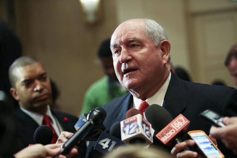 Image: Former Georgia Gov. Sonny Perdue talks with members of the media on Nov. 4, 2014 in Atlanta, Georgia.