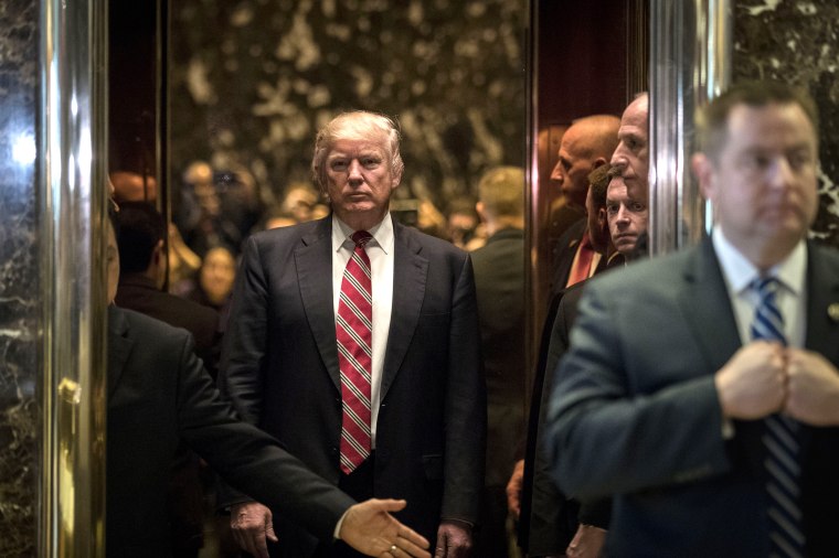 Image: President-elect Donald Trump heads back into the elevator after a meeting at Trump Tower, Jan. 16, 2017 in New York, N.Y.