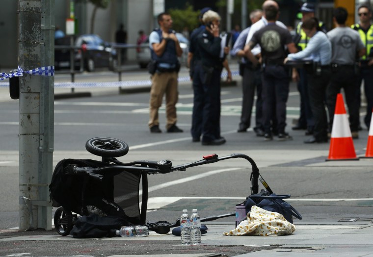 Image: A stroller is seen after a car hit pedestrians in central Melbourne