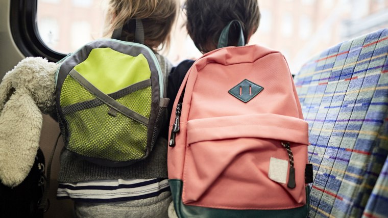 Boys wearing backpacks