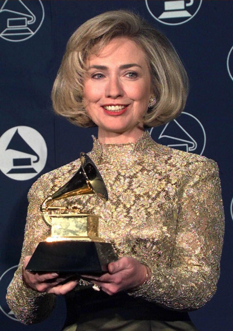 Hillary Rodham Clinton holds up her Grammy Award