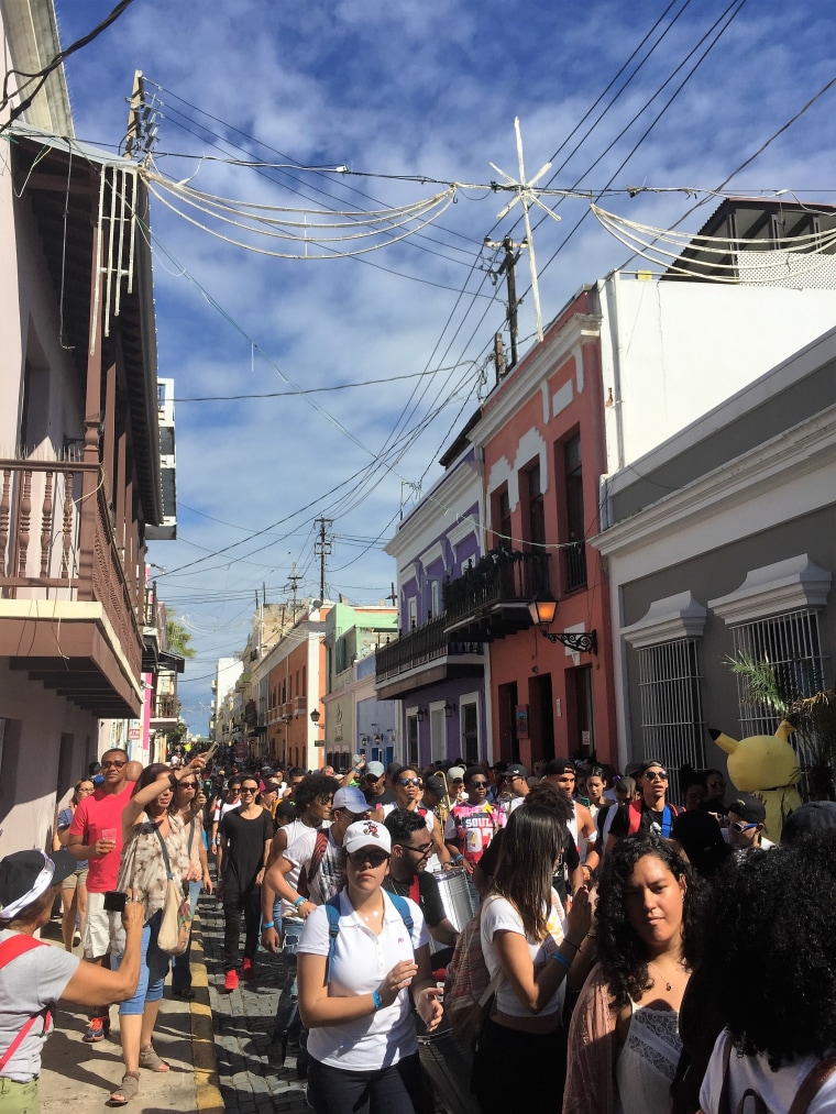 A view of the crowd walking down the Calle San Sebastian during the San Sebastian Festival in Old San Juan, P.R., Jan. 20, 2017.