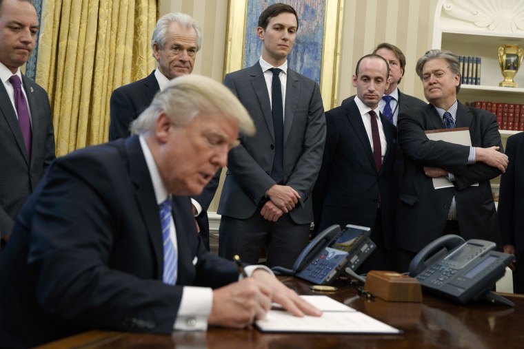 Image: Trump signs executive orders, Jan. 23, 2017.