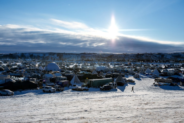 Image: Vehicles and campsites can be seen inside Oceti Sakowin camp