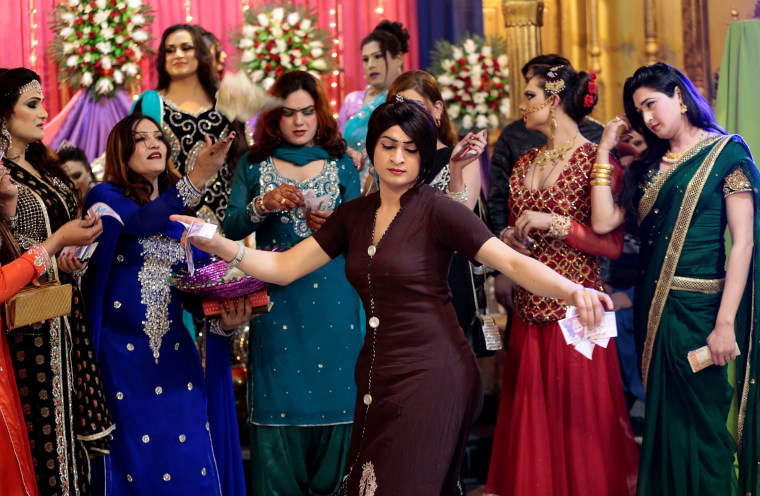 Image: Members of the transgender community dance at Shakeela's party in Peshawar