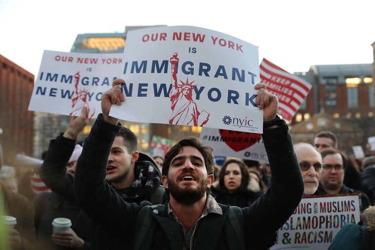 Image: Hundreds of people attend an evening rally at Washington Square Park in support of Muslims, immigrants and against the building of a wall along the Mexican border on Jan. 25, 2017 in New York City.