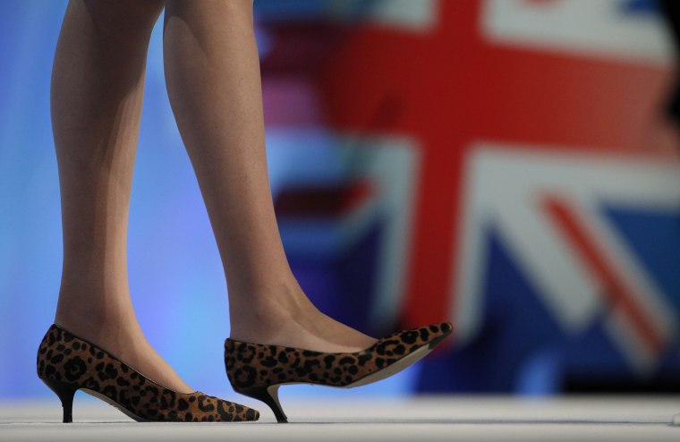 Image: Britain's Home Secretary May delivers her address on the third day of the Conservative Party Conference in Manchester