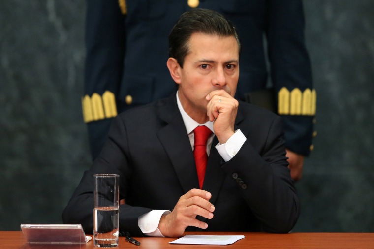 Image: Mexico's President Enrique Pena Nieto gestures during the deliver of a message about foreign affairs at Los Pinos presidential residence in Mexico City