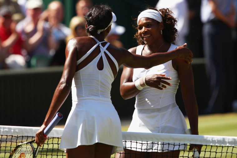 Image: Venus and Serena Williams at Wimbledon in 2009