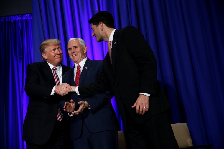 Image: President Donald Trump is greeted by Vice President Mike Pence and House Speaker Paul Ryan (R) as he arrives to speak at a congressional Republican retreat in Philadelphia, Jan. 26.