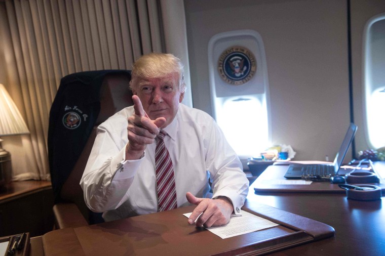 Image:President Donald Trump poses in his office aboard Air Force One at Andrews Air Force Base in Maryland