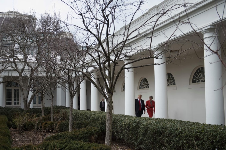 Image: President Donald Trump and British Prime Minister Theresa May walk to a press conference at the White House Jan.27 in Washington, D.C.