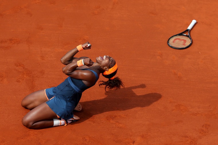 Image: 2013: Serena Williams celebrates match point in her women's singles final match against Maria Sharapova of Russia during the French Open at Roland Garros in Paris, France on June 8.