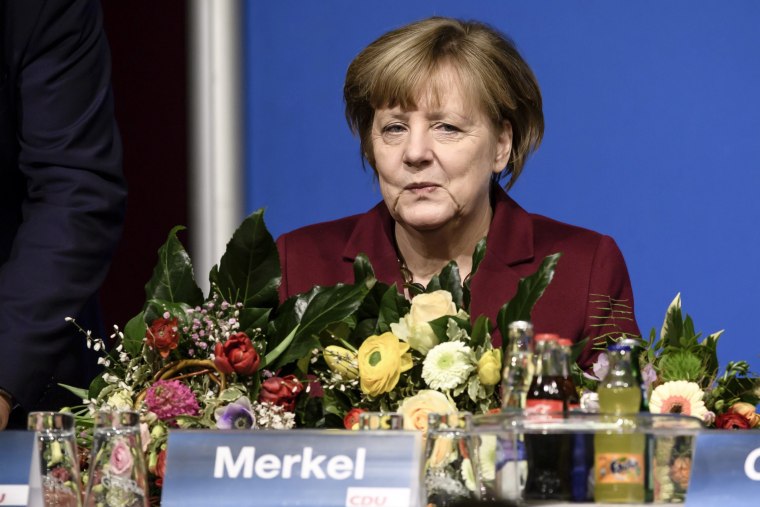 Image: German Chancellor Merkel at election district gathering