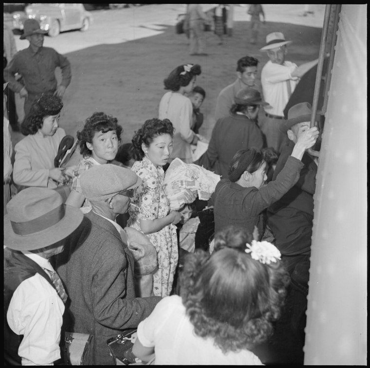 The last of the residents of the Amache concentration camp board the train at Granada, Colorado for the return journey to the west coast or to new homes elsewhere in the country.