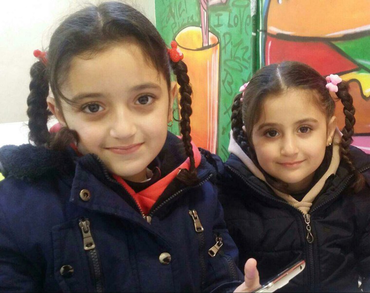 Image: Fadi Kassar's daughters Hana, 8, and Lian, 5, are Syrians who had valid visas to enter the United States, but were denied entry due to Trump's immigration ban on Saturday.