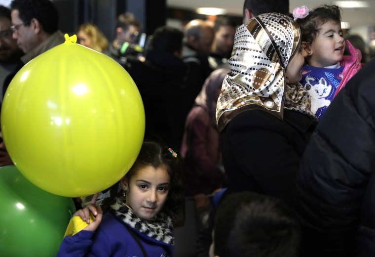 Image: Sima plays with a balloon 