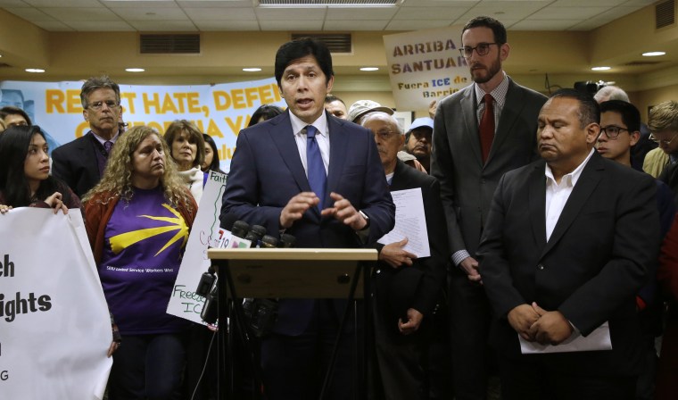 Image: State Sen. President Pro Tem Kevin de Leon discusses his measure SB54 after the Senate Pubic Safety Committee passed the bill on Jan. 31 in Sacramento, California.
