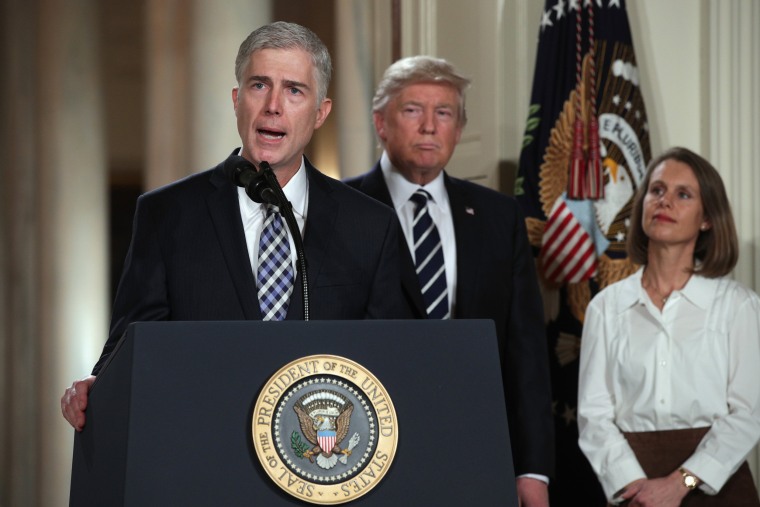 Image: Judge Neil Gorsuch delivers brief remarks after being nominated by President Donald Trump to the Supreme Court with his wife Marie Louise Gorshuch during a ceremony in the East Room of the White House on Jan. 31 in Washington, D.C.